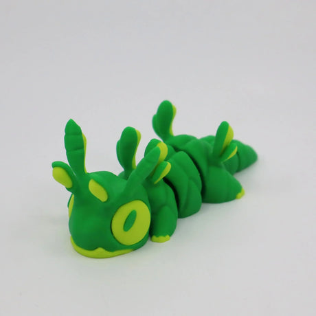 Green and yellow 3D printed caterpillar sensory toy for kids on white background