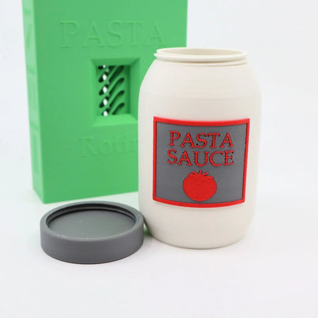 3D printed sensory toy pasta sauce jar with lid and green pasta-themed box
