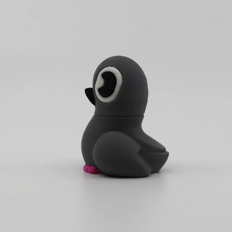 3D printed penguin fidget toy with pink feet, sensory-friendly design for kids