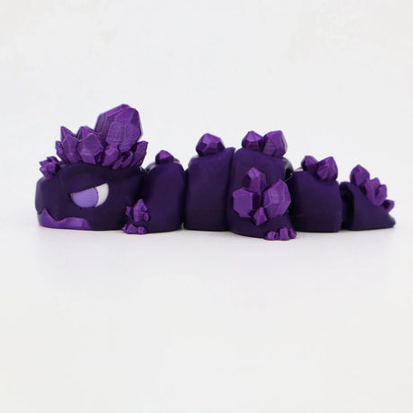 Purple 3D printed crystal dragon sensory toy with segmented body and gemstone details