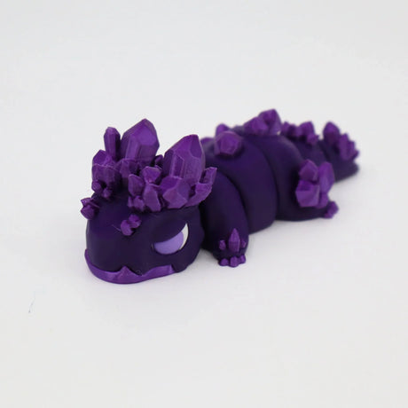 Purple 3D printed crystal gecko sensory toy on white background