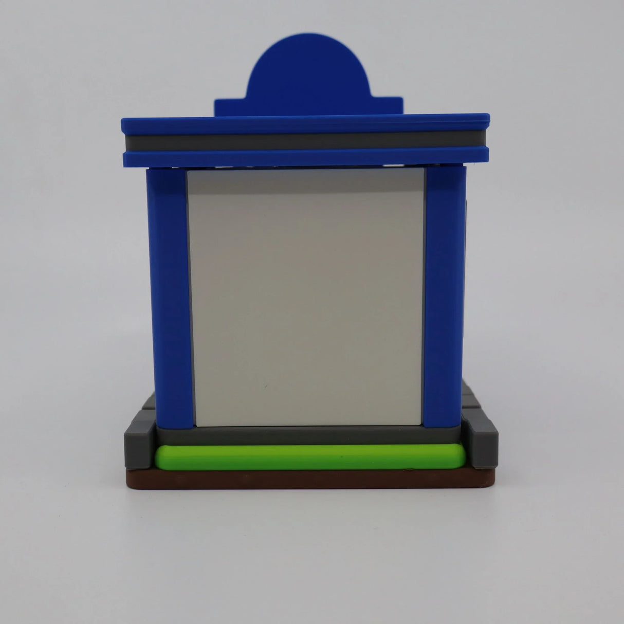 Blue 3D printed sensory toy with green base, designed for tactile play and learning