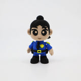 3D printed police officer fidget toy with blue uniform, yellow badge, and sensory texture for kids