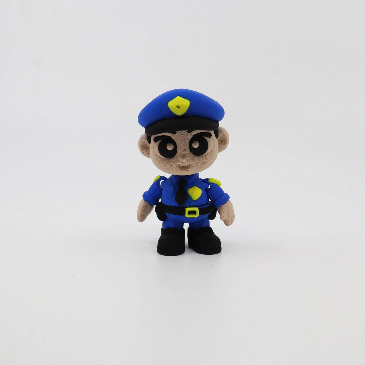3D printed police officer fidget toy for sensory play, blue uniform with yellow accents