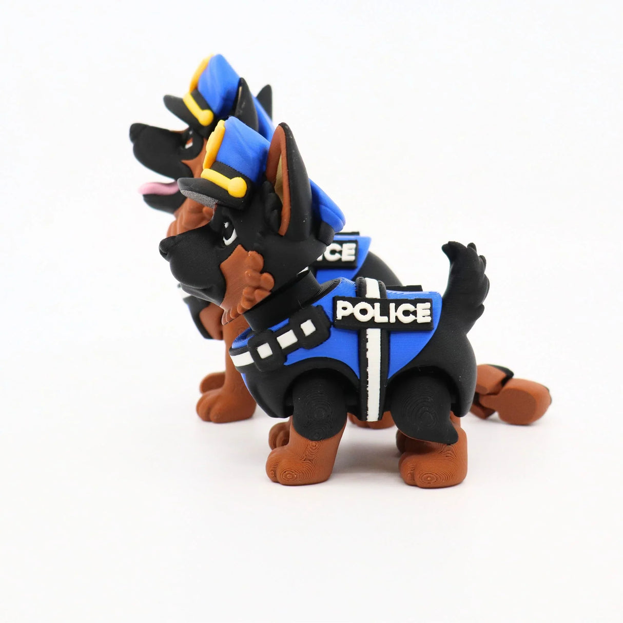 3D printed police dog fidget toy with blue vest and hat, sensory-friendly design for kids
