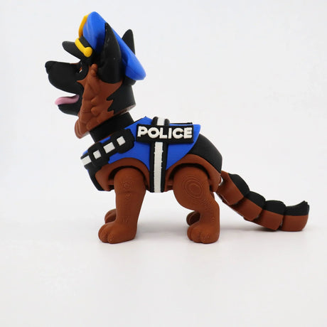3D printed police dog fidget toy with blue vest and hat, sensory-friendly design for kids