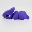 Purple 3D printed sensory toy dragon with white spikes on a white background