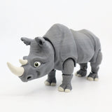 3D printed gray rhino sensory toy with movable joints on white background.