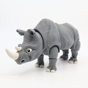 3D printed gray rhino sensory toy with movable joints on white background.