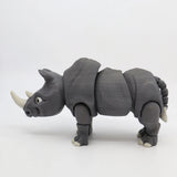 3D printed gray rhino sensory toy with flexible joints, educational animal figure