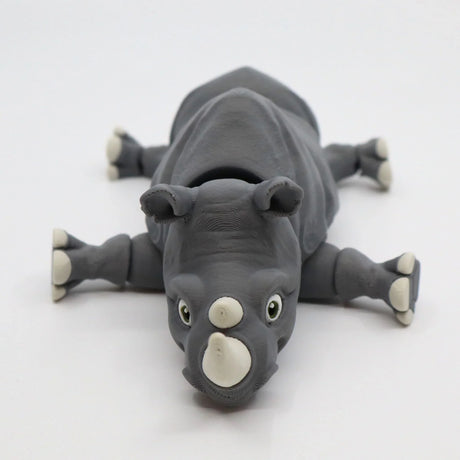 Gray 3D printed rhino sensory toy with movable limbs on white background