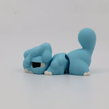 Blue 3D printed cat-shaped sensory fidget toy with flexible joints on white background