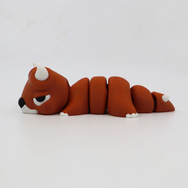 Flexible orange sensory fidget toy shaped like a segmented animal with horns and white paws