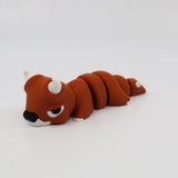 Brown 3D printed sensory toy of a segmented animal with white horns and claws on white background