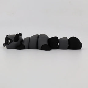 Gray and black 3D printed raccoon fidget toy with segmented, flexible body on white background