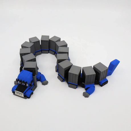 Blue 3D printed truck fidget toy with gray cargo trailers, bendable sensory toy for kids