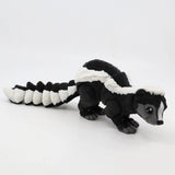 3D printed black and white skunk sensory toy with articulated tail on white background