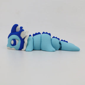 Blue and white 3D printed sensory dragon fidget toy with segmented body on white background