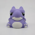 Cute purple 3D printed warthog sensory toy with white details on a plain background