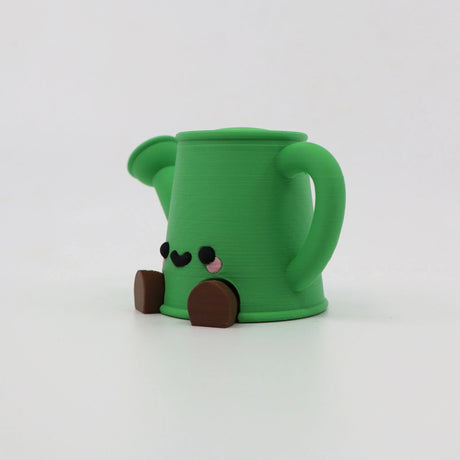 Green 3D printed koala fidget toy with cute face and brown feet, sensory friendly design
