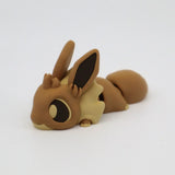 Cute brown 3D printed flexi animal sensory toy with large ears on white background