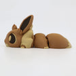 3D printed flexible brown fox sensory toy with large ears, segmented body on white background