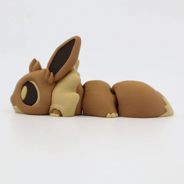 3D printed flexible brown fox sensory toy with large ears, segmented body on white background